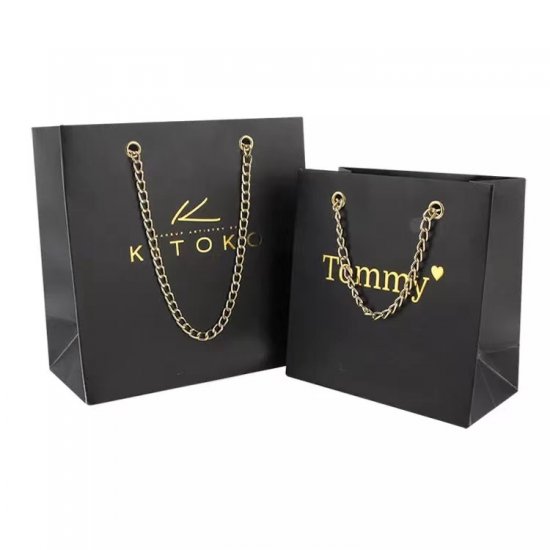 Custom luxury paper gift bags with metal chain handle